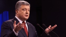 Poroşenkodan Putinə sərt ittihamlar