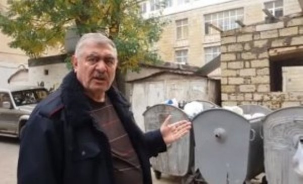 Məmurlar zibil qablarının yerini satdı, Qarabağ əlilinin maşını qarajda qaldı