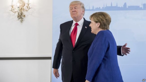 Trampla aramızda ciddi fikir ayrılığı var - Merkel
