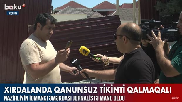 Nazirliyin idmançı əməkdaşı jurnalisti hədələdi –  VİDEO