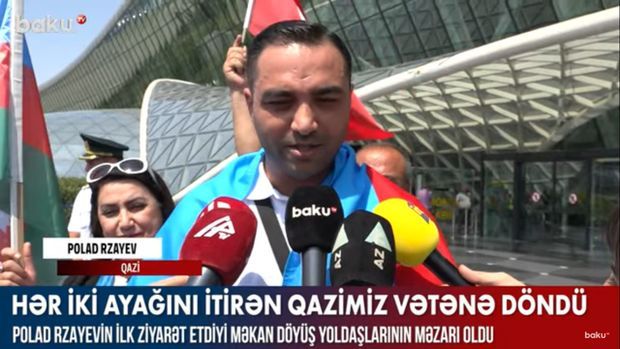 Hər iki ayağını itirən qazimiz vətənə döndü –  VİDEO