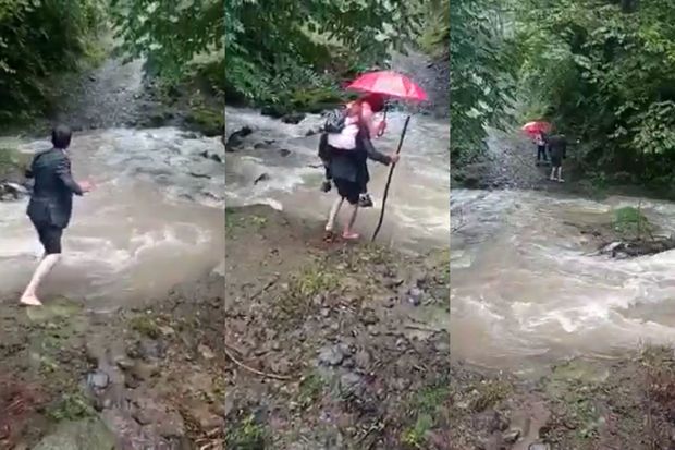 Azərbaycanda ata övladını məktəbə belində aparır - VİDEO Azərbaycanda ata övladını məktəbə belində aparır - VİDEO