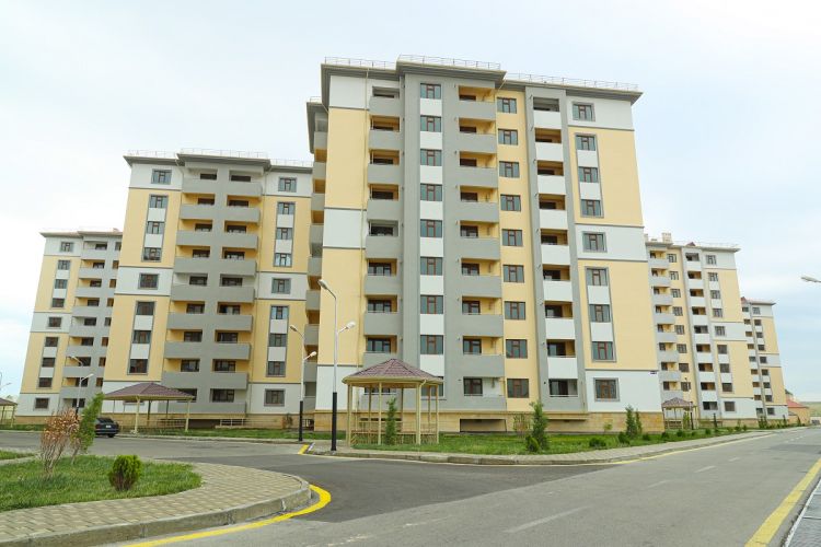 Şəhid ailələri və müharibə əlillərinə, gözdən əlilliyi  olanlara 50 mənzil verildi - FOTO