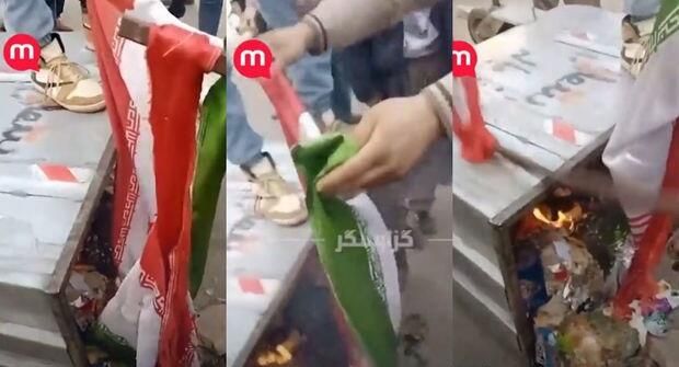 İranda bayrağı zibil qutusuna atıb yandırdılar - VİDEO
